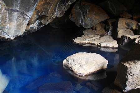冰岛格若塔贾洞穴游泳娱乐蓝色火山水池旅行岩石游戏洞穴宝座图片