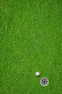 球在高尔夫球场的洞里推杆活动爱好竞赛分数俱乐部课程娱乐闲暇游戏图片