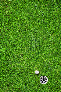 球在高尔夫球场的洞里推杆活动爱好竞赛分数俱乐部课程娱乐闲暇游戏图片