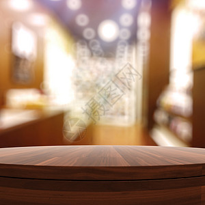 空木制圆桌和产品预产期的模糊背景阴影推介会咖啡店木板石头展示房间商业橡木木头图片