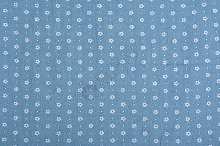 蓝色织物纹理特写背景裤子牛仔布亚麻靛青标签缝纫材料服装纺织品宏观图片