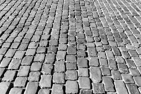 花岗岩纹理老路面灰色地面黑色鹅卵石白色街道小路材料人行道岩石图片
