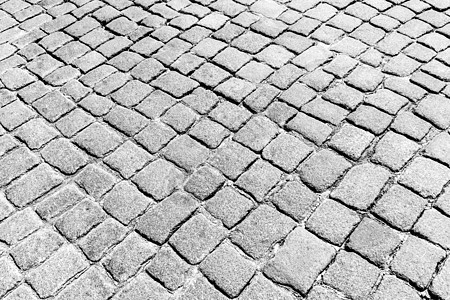 花岗岩纹理老路面小路地面岩石人行道鹅卵石正方形黑色白色材料街道图片