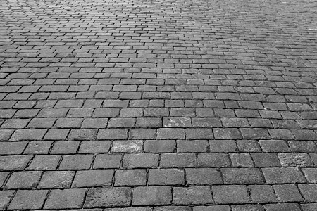 花岗岩纹理老路面材料正方形街道人行道灰色岩石鹅卵石白色黑色小路背景图片