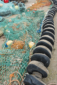 围在码头的渔网上浮标港口漂浮英语海岸渔船海洋血管舰队商业图片