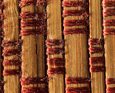 带螺纹的旧竹枝的质地黄色木头艺术栅栏圆形丛林文化材料墙纸植物图片