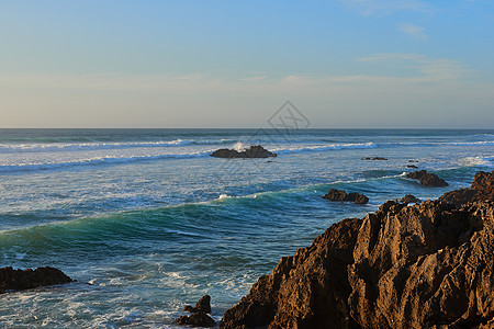 海滩的日落风景海景支撑旅游悬崖公园岩石海岸线晴天海岸图片