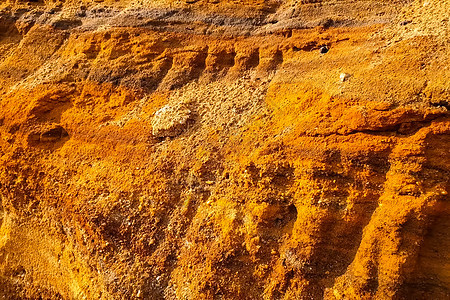 斜坡是一个采石场 岩石含有黄金 寻找黄金小路机械铁矿地球观光游客楼梯蓝色寻找者矿物图片