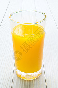 新鲜的压榨橙汁果汁食物木头液体桌子橙子水果白色玻璃热带图片