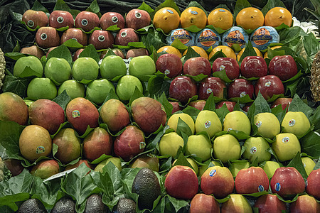 在街头市场销售水果和混果情调店铺食物橘子农业饮食收成树叶杂货店生产图片