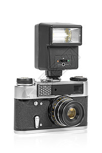 使用手动闪光灯的老式模拟照相机金属工作室光圈镁光灯格式快门镜片黑色摄影工具图片