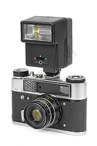 使用手动闪光灯的老式模拟照相机快门黑色闪光格式摄影镜片照片光圈金属工作室图片