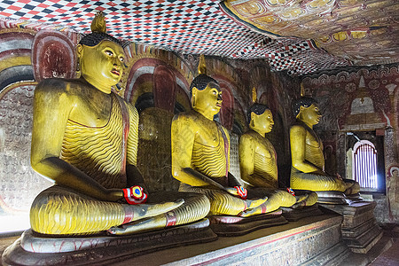 佛像排在丹布尔拉洞穴的内侧纪念碑文化岩石艺术洞穴历史性旅游宗教世界遗产绘画图片
