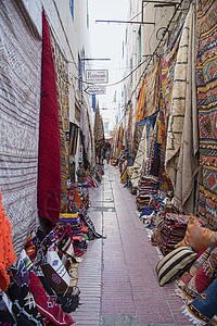 草地上一条巷子的地毯墙壁旅游建筑学建筑店铺市场街道城市文化露天小地毯图片