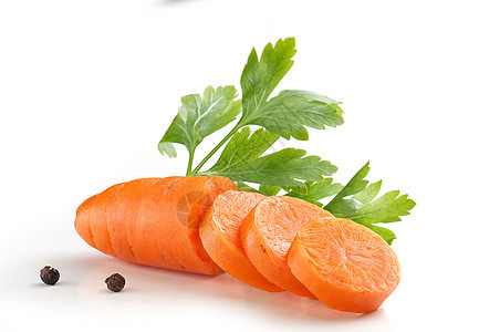 一大片胡萝卜饮食胡椒黑色蔬菜绿色树叶隔断食物烹饪健康背景图片