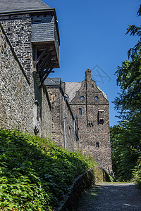 M的阿尔特纳城堡建筑蓝色石工座位灰色山刺天空堡垒石头大门图片