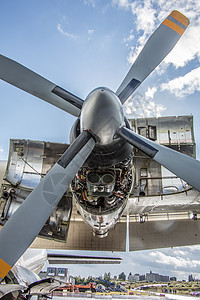 军用运输机作为涡轮螺旋飞机蓝色反思力学镶板铲子螺旋桨航空运输车电缆翅膀图片
