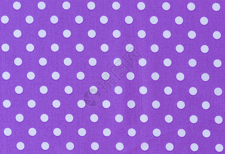 白点紫色纺织品的布面背景纹理图片