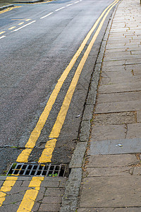 双黄双线驾驶黄色交通线条街道运输路面阴影图片