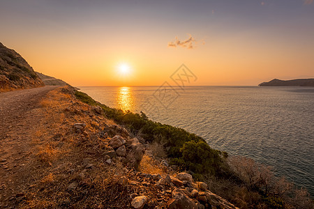 斯皮那隆加附近克里特岛的黎明 一个夏天海景阳光旅行支撑海岸假期石头地平线日落太阳图片