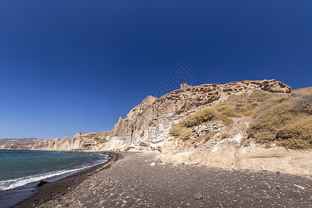 峡谷山和海 在Vlychada有黑色火山海滩岩石假期海景海岸旅游热带支撑太阳海岸线阳光背景图片