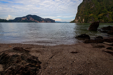 詹姆斯邦德岛海滩旅游情调天堂蓝色岩石海岸独木舟风景海洋石头图片