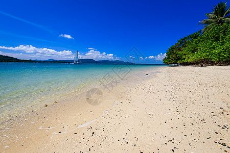 有金沙和海的海滩天空假期海洋海景旅行旅游水晶蓝色热带风景图片