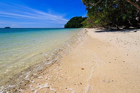 有金沙和海的海滩海景白色旅游蓝色天空水晶热带气候假期海洋图片