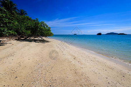 有金沙和海的海滩热带假期水晶旅行气候旅游天空蓝色海景风景图片