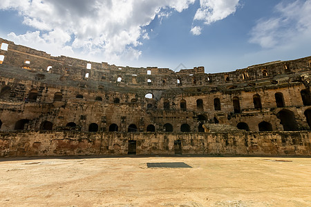 罗马风情突尼斯的岩石剧院纪念碑娱乐天空蓝色观光竞技场假期考古学背景