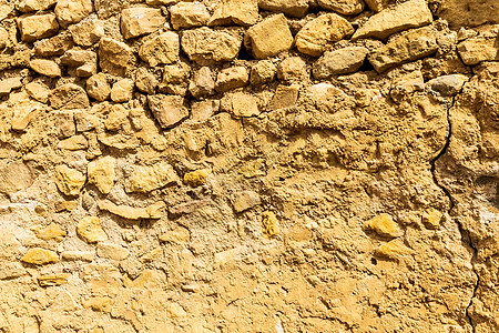 罗马风情古砖和混凝土墙的背景卵石建筑学灰色建筑岩石棕色古董橙子黑色花岗岩背景