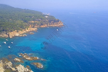 西班牙的地中海海岸 西班牙的海边法院天空天堂奢华海岸爬坡岩石天线蓝色房子街道图片