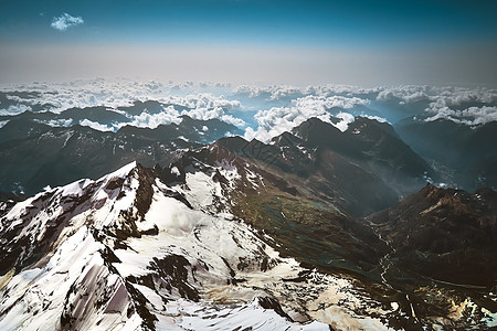 Monte Rosa 山丘地貌的阿尔卑斯山冰雪岩石顶峰蓝色全景滑雪旅行白色山脉高山冰川图片