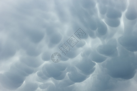 蒙上哺乳期的云天空雷雨乳状云气候戏剧性心情天气蓝色风暴哺乳动物图片
