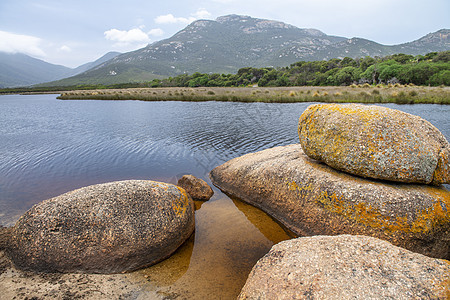 澳大利亚国家公园 Tidal河和roc海岸线国家池塘风景山脉卵石石材阳光旅行地标图片