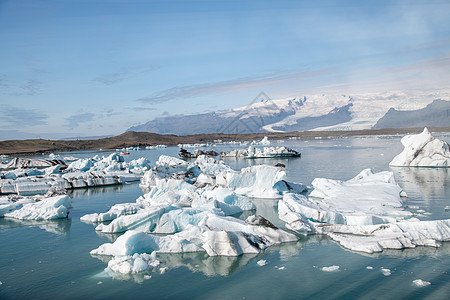 冰岛Jokulsarlon湖的冰山极地旅行蓝色场景荒野旅游反射山脉环境风景图片