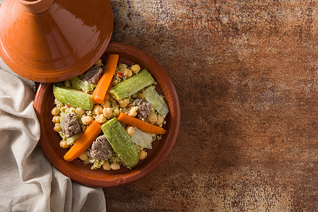 蔬菜 小鸡豆 肉类和生锈本底的食谱传统塔吉尼食物羊肉饮食营养美食图片