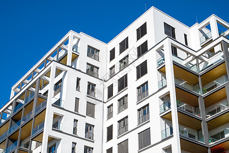柏林现代公寓楼群市场住房植物公寓建筑学灰色建筑投资白色天空图片