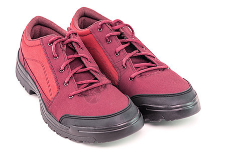 一双简单的廉价红色徒步鞋 孤立在白色背景上  视角近视视图鞋类销售活动橡皮运动鞋跑步织物店铺运动鞋带图片