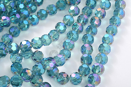 美丽的浅蓝玻璃闪光花粉水晶珠装饰火花蓝色宏观奢华风格爱好石头钻石礼物图片