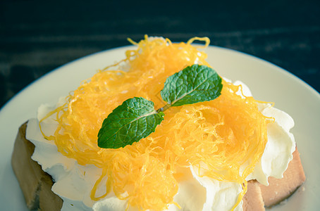 金蛋黄银线或早餐便饭盘子蜜饯火塘金线食物热带糖果甜点图片
