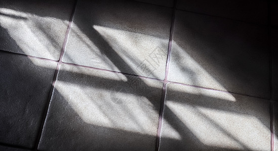 关于通过风向阳光的软阴影的抽象概念摘要化背景框架线条长方形建筑学水泥瓷砖白色房间黑色图片