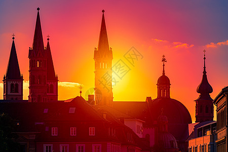 日落在德国巴伐利亚的Wurzburg市上空地标旅游建筑学太阳文化宗教教会圆顶城市景观图片