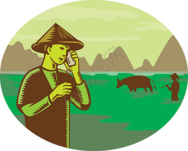 越南农民使用移动电话 Woodcuter图片