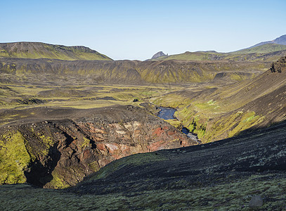 冰岛地貌 有蓝色马尔卡弗约特河峡谷 绿色山丘和艾因希宁古尔独角兽山 冰岛费利亚巴克自然保护区图片
