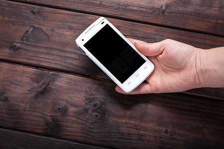 手机手持移动电话白色木头黑色展示屏幕网络技术工具细胞空白图片