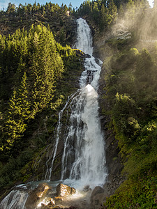 爬上斯图本瀑布远足假期岩石高山娱乐远足者外表运动自由旅行图片