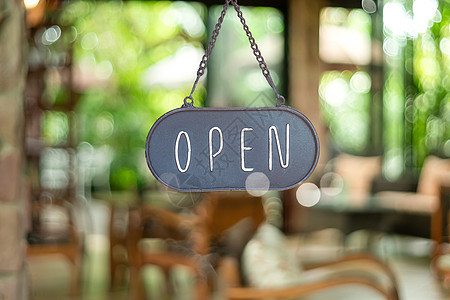 一个商业标志 上面写着咖啡馆或餐馆开放 挂在入口处的门上 古典色彩风格杂货店餐厅店铺酒吧街道入口木板艺术食物窗户图片