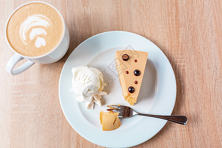 一个焦糖芝士蛋糕 配冰淇淋咖啡脆皮饼干面包蛋糕焦糖食物餐厅香草美食图片