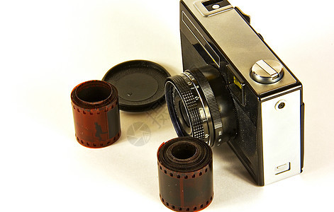 旧电影照相机和摄影胶片图片